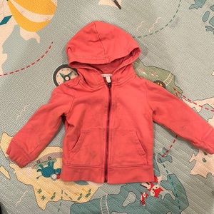 Pink zip hoodie from Primary